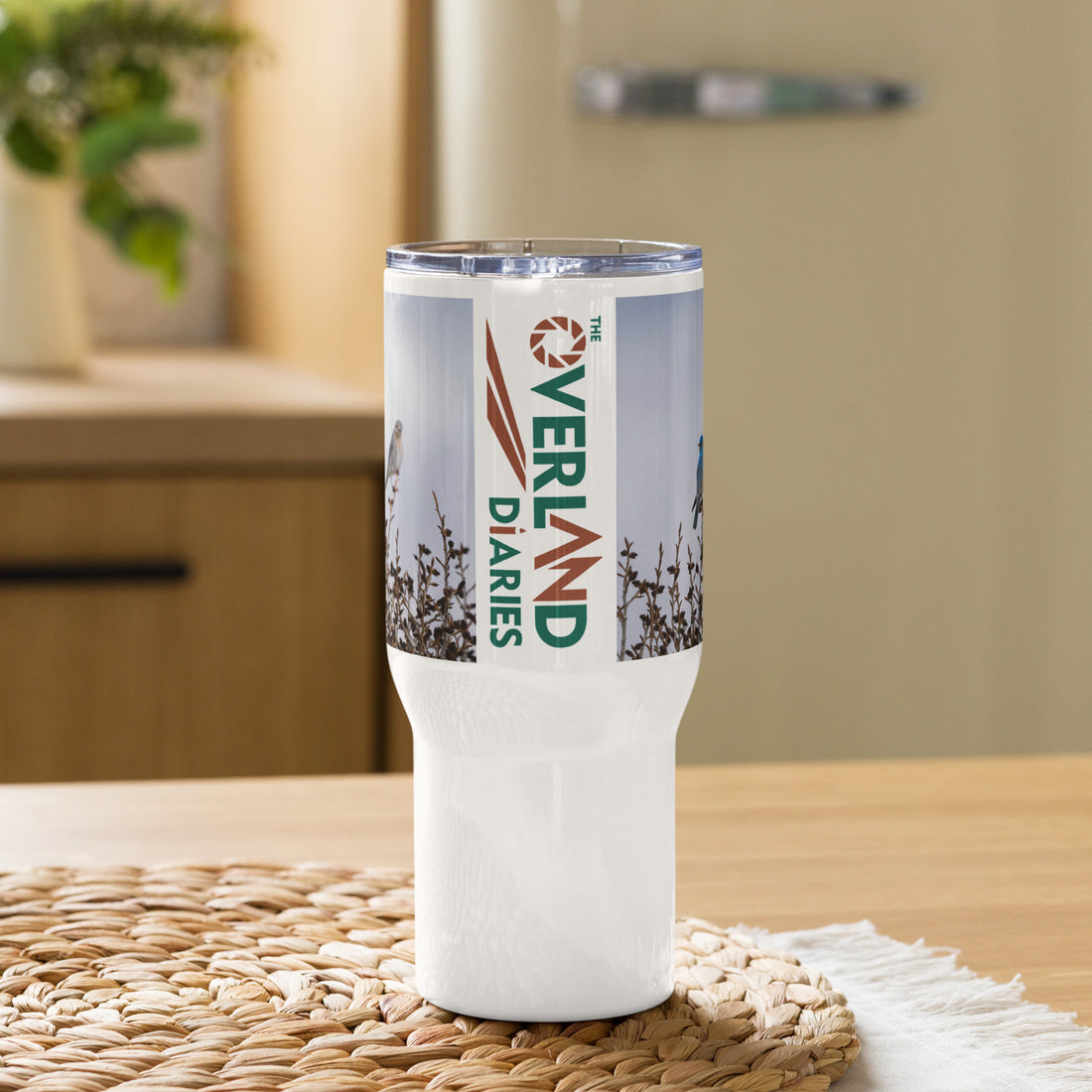 Mountain Bluebirds Travel mug with a handle