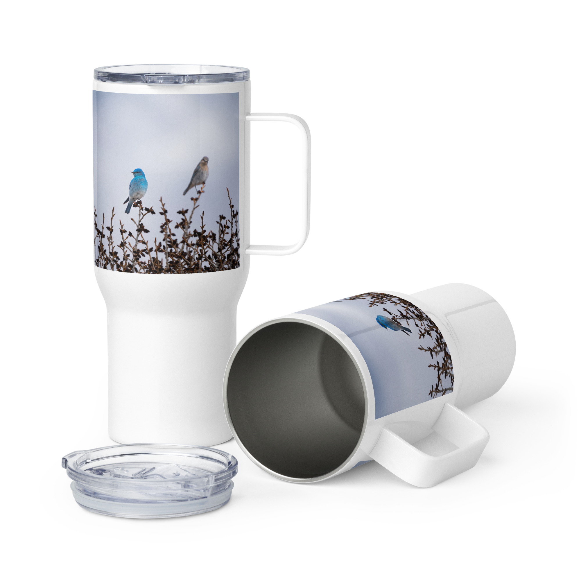 Mountain Bluebirds Travel mug with a handle