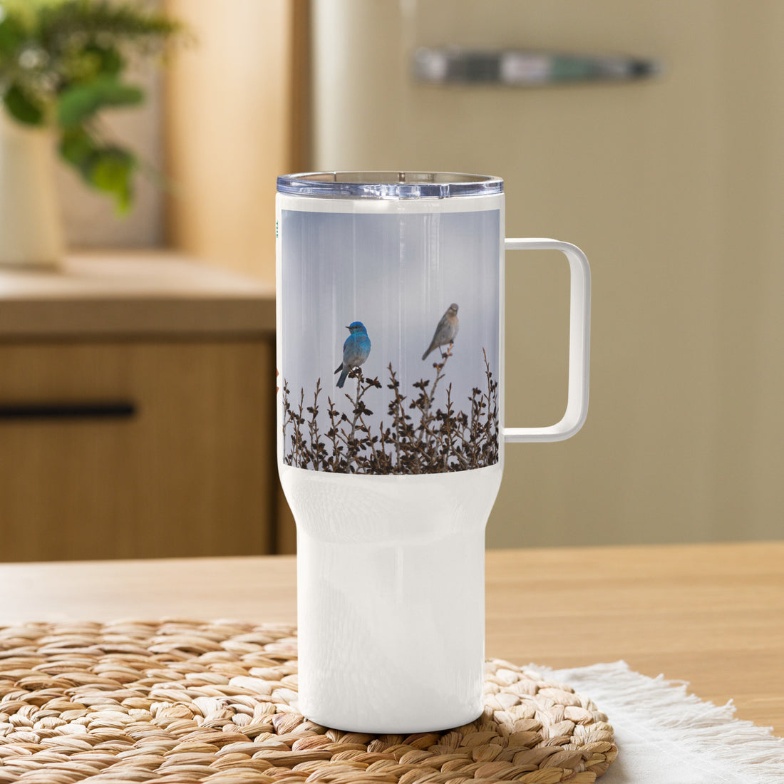 Mountain Bluebirds Travel mug with a handle